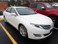 Front 3/4 View of 2016 Lincoln MKZ 3.7 AWD #4