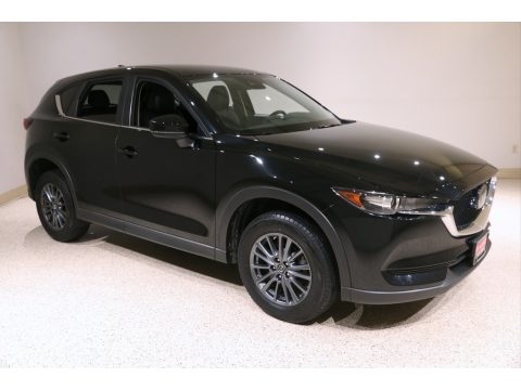 Jet Black Mica Mazda CX-5 Touring AWD. Click to enlarge. Jet Black Mica Mazda CX-5 Touring AWD. Click to enlarge.