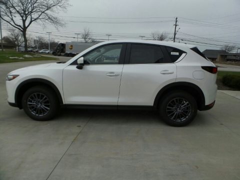 Snowflake White Pearl Mica Mazda CX-5 Touring AWD. Click to enlarge. Snowflake White Pearl Mica Mazda CX-5 Touring AWD. Click to enlarge.
