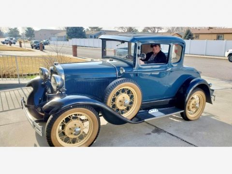 Blue Ford Model A Rumble Seat Coupe.  Click to enlarge.