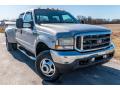 Front 3/4 View of 2002 Ford F350 Super Duty XLT Crew Cab 4x4 Dually #1