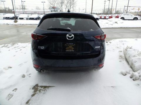 Deep Crystal Blue Mica Mazda CX-5 Grand Touring AWD.  Click to enlarge.