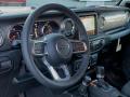 Dashboard of 2021 Jeep Wrangler Unlimited Sahara 4x4 #9