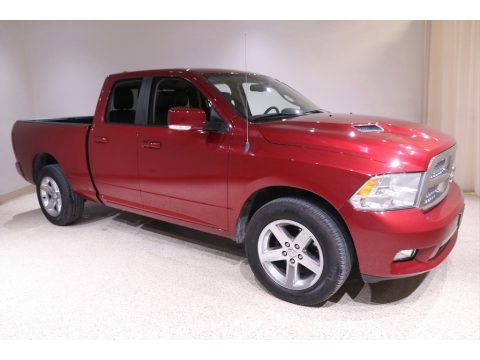 Deep Cherry Red Crystal Pearl Dodge Ram 1500 Sport Quad Cab 4x4.  Click to enlarge.