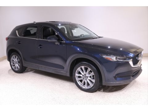 Deep Crystal Blue Mica Mazda CX-5 Grand Touring AWD. Click to enlarge. Deep Crystal Blue Mica Mazda CX-5 Grand Touring AWD. Click to enlarge.