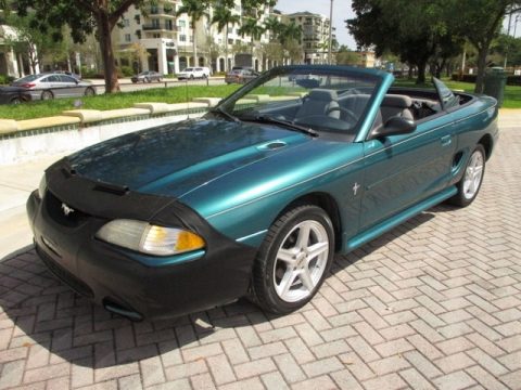 Pacific Green Metallic Ford Mustang V6 Convertible.  Click to enlarge.