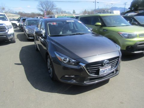 Machine Gray Metallic Mazda MAZDA3 Touring 4 Door.  Click to enlarge.