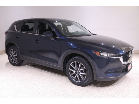 Deep Crystal Blue Mica Mazda CX-5 Touring AWD. Click to enlarge. Deep Crystal Blue Mica Mazda CX-5 Touring AWD. Click to enlarge.