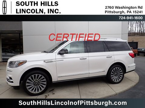 White Platinum Metallic Tri-Coat Lincoln Navigator Reserve 4x4.  Click to enlarge.