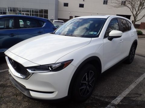 Snowflake White Pearl Mica Mazda CX-5 Touring AWD.  Click to enlarge. Snowflake White Pearl Mica Mazda CX-5 Touring AWD.  Click to enlarge.