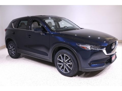 Deep Crystal Blue Mica Mazda CX-5 Grand Touring AWD. Click to enlarge. Deep Crystal Blue Mica Mazda CX-5 Grand Touring AWD. Click to enlarge.