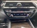 Controls of 2021 BMW 5 Series M550i xDrive Sedan #21