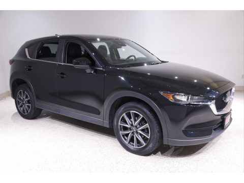 Jet Black Mica Mazda CX-5 Touring AWD. Click to enlarge. Jet Black Mica Mazda CX-5 Touring AWD. Click to enlarge.