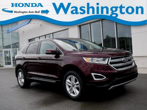 Ruby Red Metallic Ford Edge SEL AWD.  Click to enlarge.