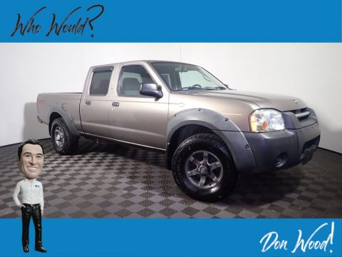 Sand Dune Metallic Nissan Frontier XE V6 King Cab 4x4.  Click to enlarge.