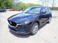 Front 3/4 View of 2021 Mazda CX-5 Grand Touring Reserve AWD #5