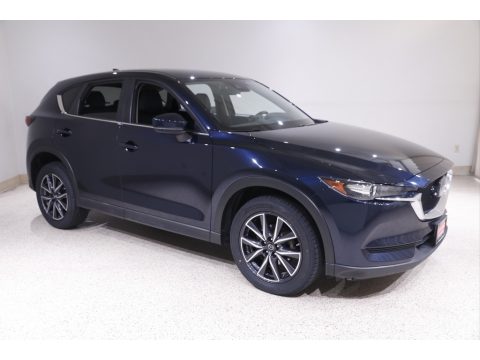 Deep Crystal Blue Mica Mazda CX-5 Touring AWD. Click to enlarge. Deep Crystal Blue Mica Mazda CX-5 Touring AWD. Click to enlarge.