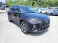 Front 3/4 View of 2022 Hyundai Tucson Limited Hybrid AWD #3