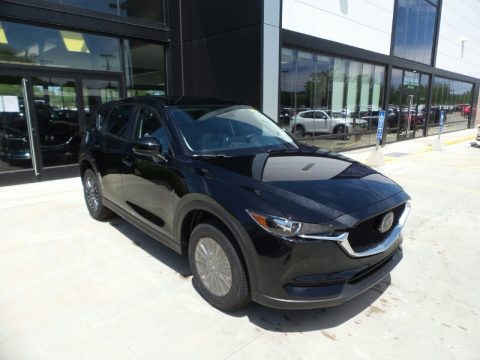 Jet Black Mica Mazda CX-5 Touring AWD. Click to enlarge. Jet Black Mica Mazda CX-5 Touring AWD. Click to enlarge.