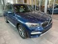 Front 3/4 View of 2021 BMW X3 xDrive30e #1