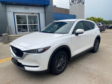 Snowflake White Pearl Mica Mazda CX-5 Touring AWD. Click to enlarge. Snowflake White Pearl Mica Mazda CX-5 Touring AWD. Click to enlarge.
