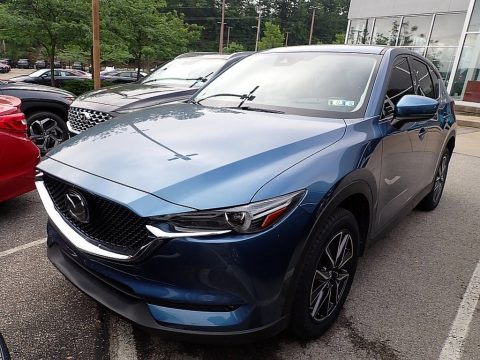 Eternal Blue Metallic Mazda CX-5 Grand Touring AWD.  Click to enlarge. Eternal Blue Metallic Mazda CX-5 Grand Touring AWD.  Click to enlarge.
