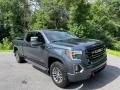 Front 3/4 View of 2021 GMC Sierra 1500 AT4 Crew Cab 4WD #6