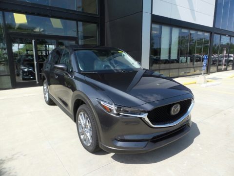 Machine Gray Metallic Mazda CX-5 Grand Touring Reserve AWD. Click to enlarge. Machine Gray Metallic Mazda CX-5 Grand Touring Reserve AWD. Click to enlarge.