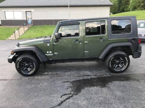 Jeep Green Metallic Jeep Wrangler Unlimited X 4x4 Right Hand Drive.  Click to enlarge.