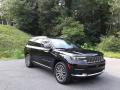 Front 3/4 View of 2021 Jeep Grand Cherokee L Summit Reserve 4x4 #4