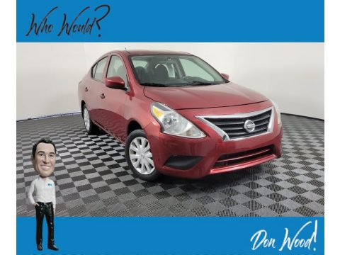 Cayenne Red Nissan Versa S.  Click to enlarge.