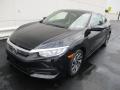 Front 3/4 View of 2018 Honda Civic LX Coupe #8