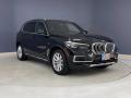 Front 3/4 View of 2022 BMW X5 xDrive45e #27