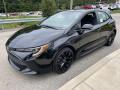 Front 3/4 View of 2022 Toyota Corolla Hatchback SE Nightshade Edition #7