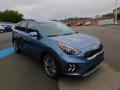 Front 3/4 View of 2022 Kia Niro Touring Special Edition Hybrid #9