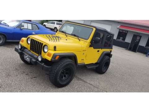 Solar Yellow Jeep Wrangler Sport 4x4.  Click to enlarge.
