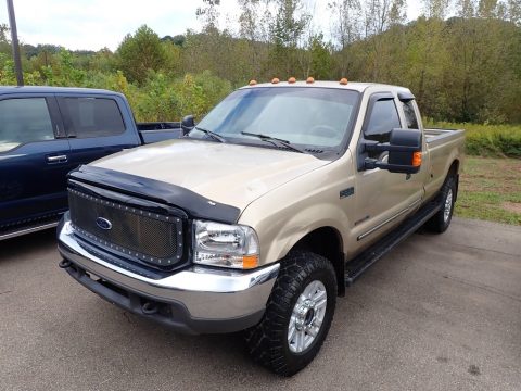 Harvest Gold Metallic Ford F350 Super Duty Lariat Crew Cab 4x4.  Click to enlarge.