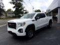 Front 3/4 View of 2021 GMC Sierra 1500 AT4 Crew Cab 4WD #7