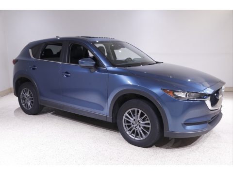 Eternal Blue Mica Mazda CX-5 Touring AWD.  Click to enlarge. Eternal Blue Mica Mazda CX-5 Touring AWD.  Click to enlarge.