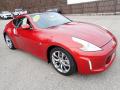 Front 3/4 View of 2014 Nissan 370Z Touring Coupe #7