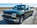 Front 3/4 View of 2004 Chevrolet Silverado 1500 Work Truck Extended Cab #8