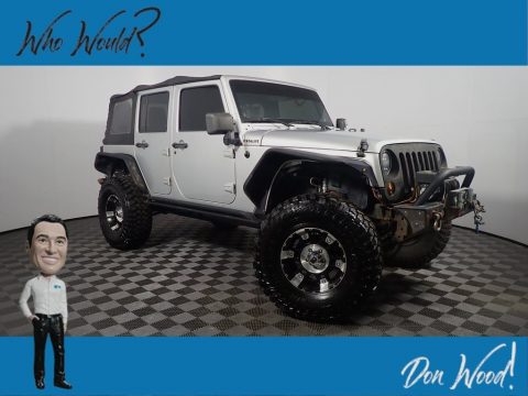 Bright Silver Metallic Jeep Wrangler Unlimited Sport 4x4.  Click to enlarge.