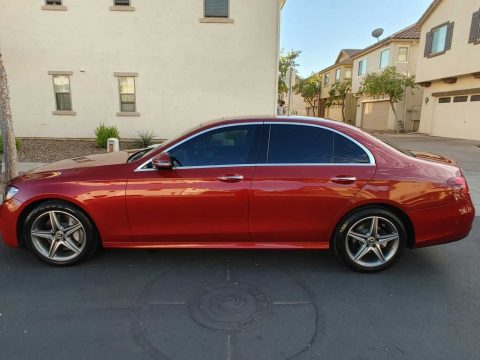 designo Cardinal Red Metallic Mercedes-Benz E 300 Sedan.  Click to enlarge.