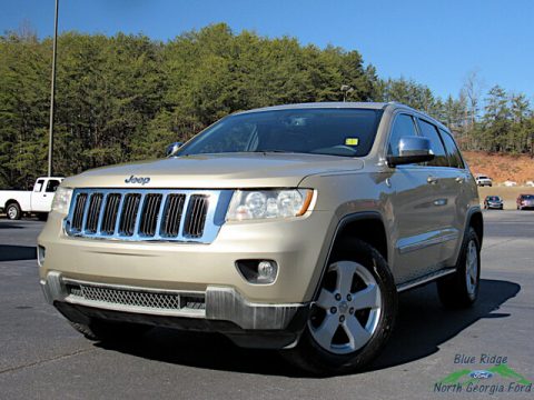 White Gold Metallic Jeep Grand Cherokee Laredo X Package 4x4.  Click to enlarge.