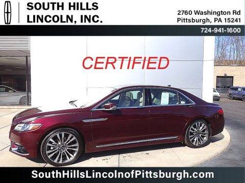 Burgundy Velvet Metallic Lincoln Continental Reserve AWD.  Click to enlarge.