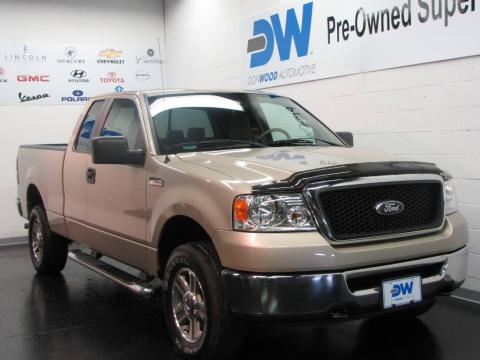 Pueblo Gold Metallic Ford F150 XLT SuperCab 4x4.  Click to enlarge.