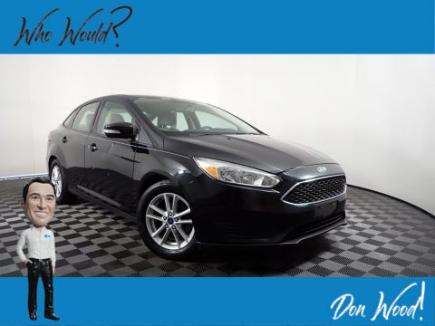 Tuxedo Black Metallic Ford Focus SE Sedan.  Click to enlarge.