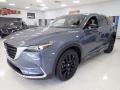 Front 3/4 View of 2022 Mazda CX-9 Carbon Edition AWD #7
