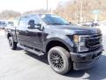 Front 3/4 View of 2021 Ford F250 Super Duty Lariat Crew Cab 4x4 #2