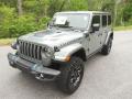 Front 3/4 View of 2022 Jeep Wrangler Unlimited Rubicon 4XE Hybrid #2